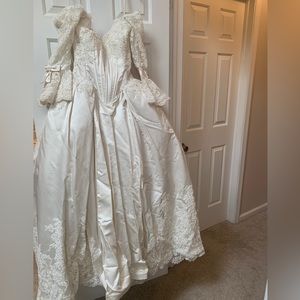 Wedding dress. Purchased as a size 8 but fits as a tight 6. My waist is 29in.